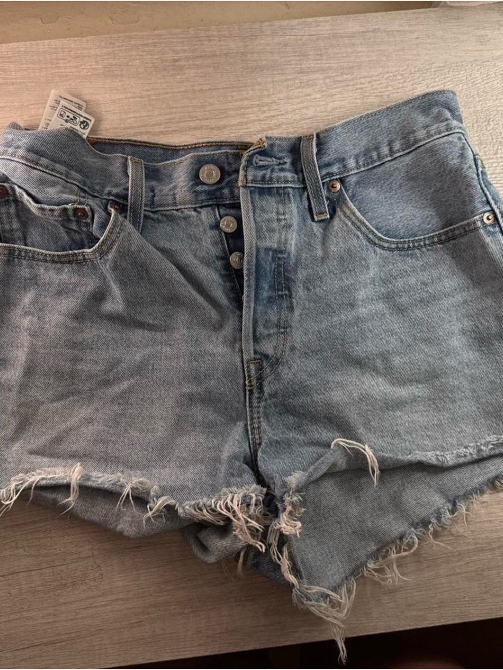 Levi’s high waist frayed denim shorts